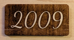 A basic rounded rectangle with background engraved so "2009" pops out